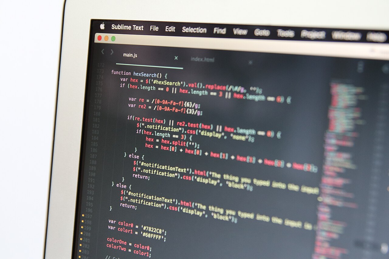Close-up of a laptop screen showing code